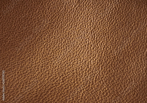  Texture of genuine leather. Brown color background.