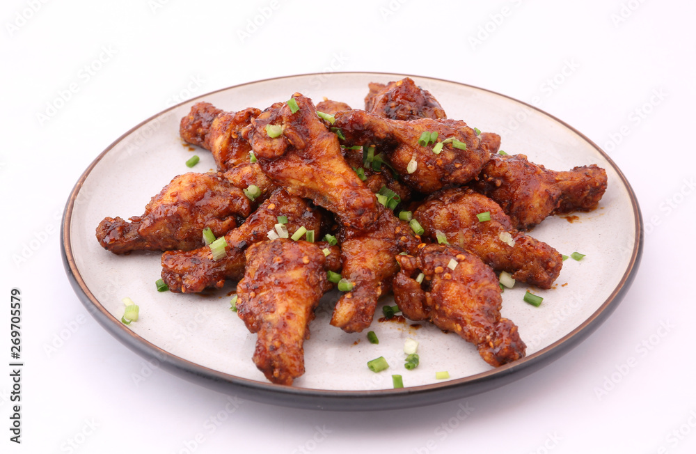 Delicious Korean fried chicken on a white background.