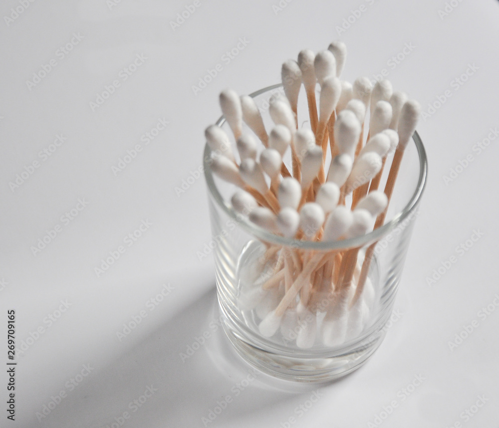 Wooden ear swabs in a glass Wooden ear swabs in a glass