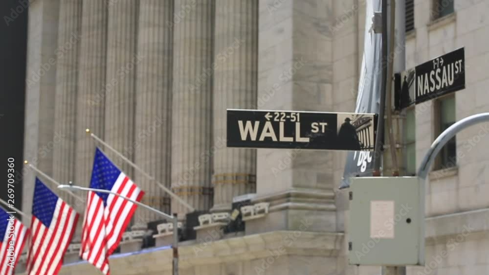 america flag waving in near the office near the wall street