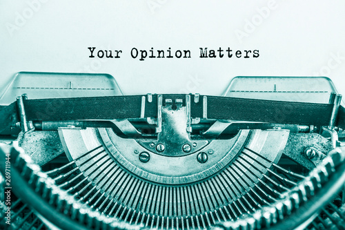 Your Opinion Matters printed on a sheet of paper on a vintage typewriter.