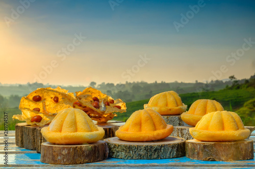 Malaysia traditional sweet as known as Baulu or Bahulu and Rempeyek photo