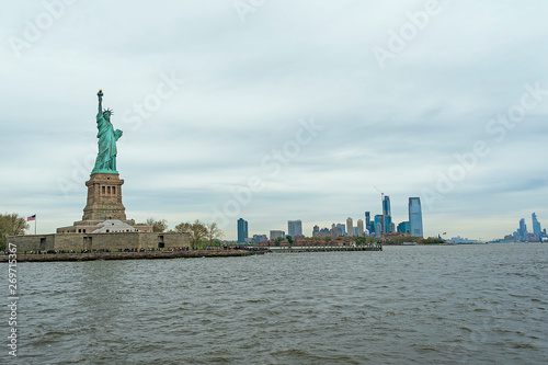 USA  New York - May 2019  Statue of Liberty  Liberty Island  with Manhtattan in the background