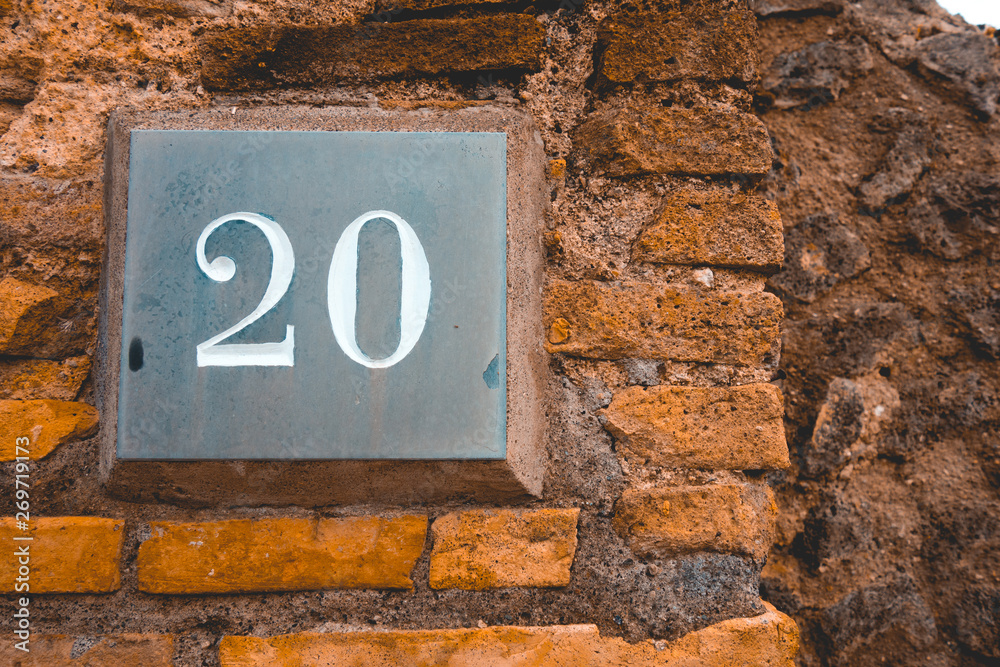 handmade sign of number 20 on brown background handmade sign of number 20 on brown background