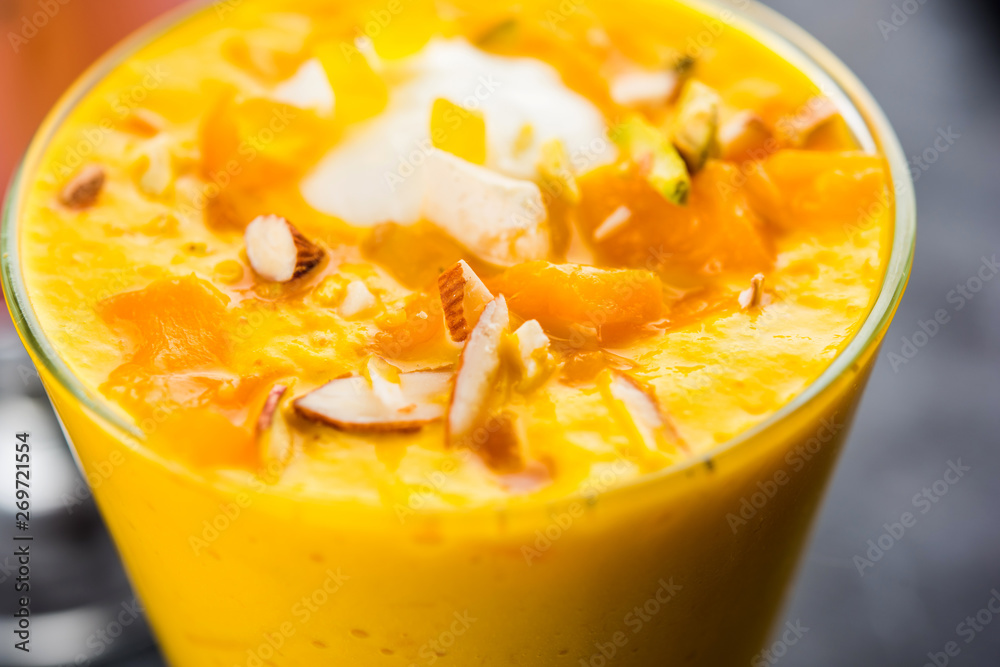 Falooda / Faluda is a popular Indian dessert - Strawberry and Mango flavoured which has Ice cream, noodles, sweet basil seeds and nuts, selective focus Falooda / Faluda is a popular Indian dessert - Strawberry and Mango flavoured which has Ice cream, noodles, sweet basil seeds and nuts, selective focus