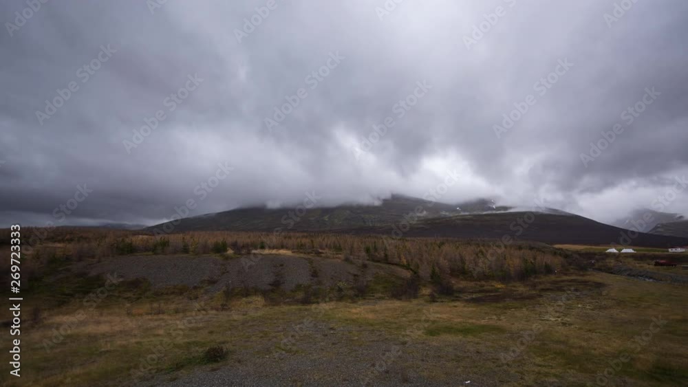 Timelapse on a foggy day with clouds moving and amazing landscape in view Timelapse on a foggy day with clouds moving and amazing landscape in view