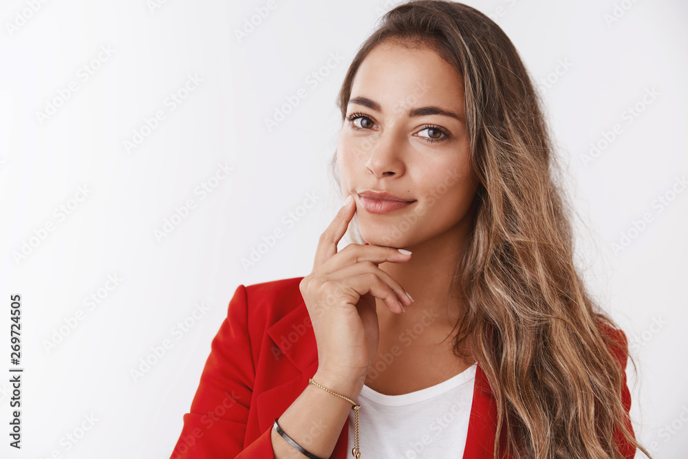 Close-up self-assured successful rich businesswoman wearing red jacket touching jawline smiling confident looking camera smart intelligent, know how maintain business attract customers Close-up self-assured successful rich businesswoman wearing red jacket touching jawline smiling confident looking camera smart intelligent, know how maintain business attract customers