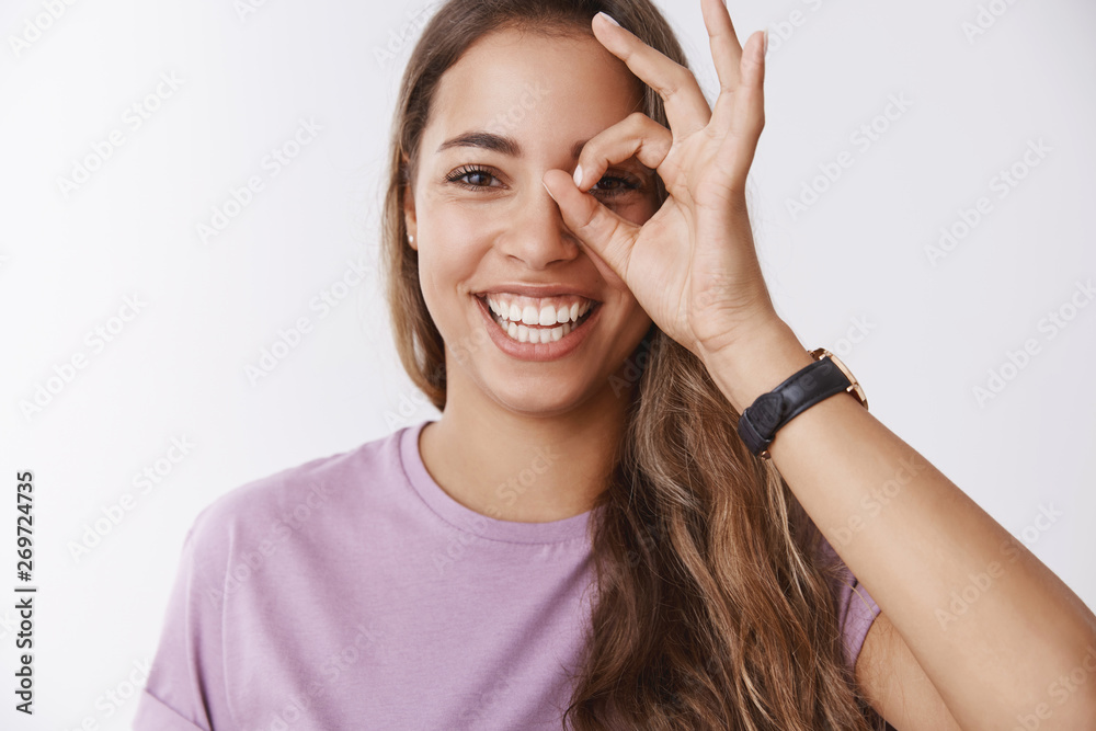 Charming ecstatic accomplished happy caucasian woman feeling playful upbeat enjoying life showing okay no problem gesture expressing relief relaxation, wellbeing, having fun white background