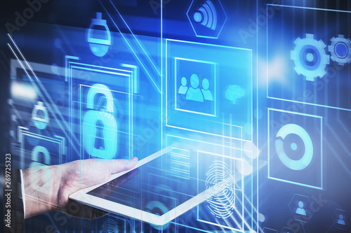 Wallpaper Mural Man with tablet, online security interface Torontodigital.ca