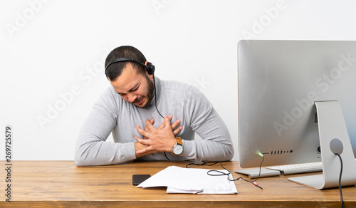 Telemarketer Colombian man having a pain in the heart