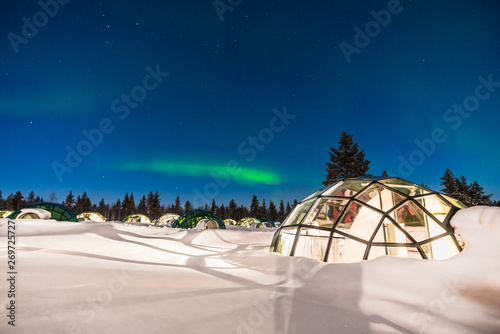 Northern lignt in Finland over Igloo house 