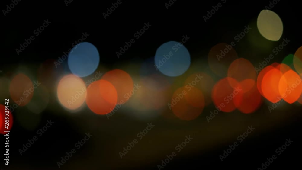 Beautiful glowy busy traffic lights bokeh at midnight, abstract medium shot Beautiful glowy busy traffic lights bokeh at midnight, abstract medium shot