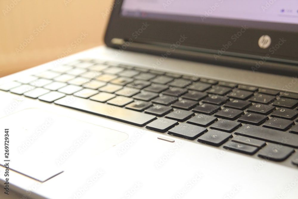 typing on a laptop computer keyboard close up typing on a laptop computer keyboard close up