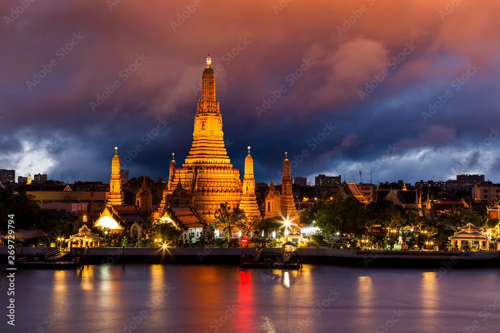 Wat Arun, at Chao Phraya river at sunset, Bangkok, Thailand.