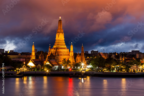 Wat Arun, at Chao Phraya river at sunset, Bangkok, Thailand.