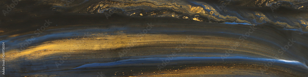 Abstract marbleized effect background. Blue and black creative colors. Beautiful paint with the addition of gold