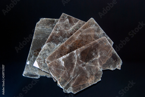 A sample of natural mineral. Muscovite mica. Origin: Russia, Ural. photo