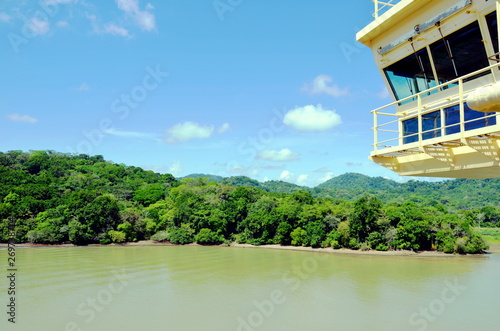 Green landscape of the Panama Canal, view from the transiting container ship. © Mariusz