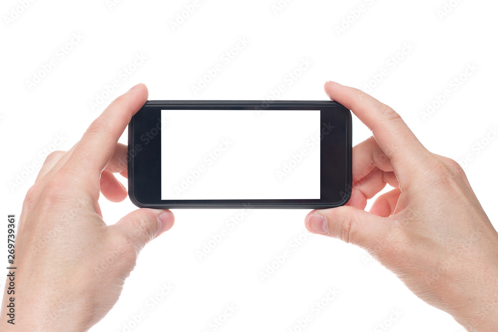 Hand holding black Smartphone with blank screen on white backgroun.