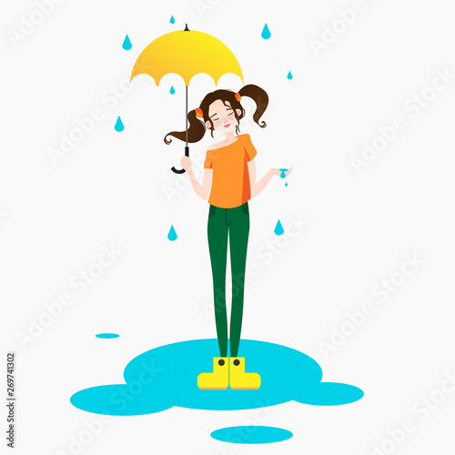 Girl smiles and laughs in the rain. the rain falls  the drops fall on his face and the girl is happy with life and nature around