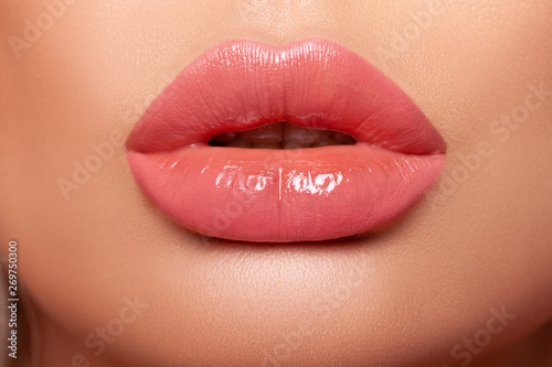  Sexy plump Lips Close-up. Lip Gloss. Beautiful  Perfect Makeup. Beautiful lips. Beauty. Cosmetic lips. Cosmetic beauty procedures.   - image . 