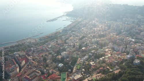 Aerial view of the hill and residential district of Vomero in Naples, Italy. Many are the buildings built in the narrow streets of the city. In the Backgroung Nisida Island and Fuorigrotta district. photo
