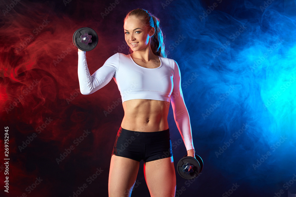 A Woman Lifting Dumbbells · Free Stock Photo