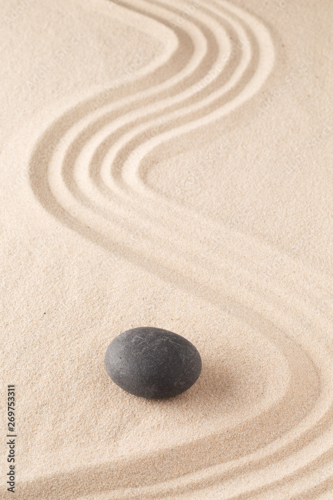 Fototapeta premium meditation stone in Japanese zen garden. Concept for focus and concentration to reach spiritual balance, purity and harmony of mind and soul. Spa wellness or mindfulness background with copy space. .