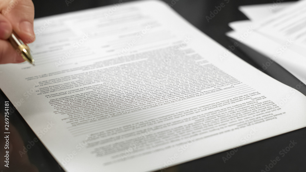 Businessman holding pen signing agreement, making deal, real estate rent, credit Businessman holding pen signing agreement, making deal, real estate rent, credit