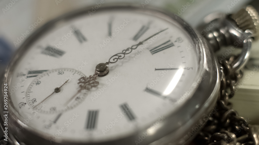 Pocket watch dial close-up, time flying by, history and heritage, memories Pocket watch dial close-up, time flying by, history and heritage, memories