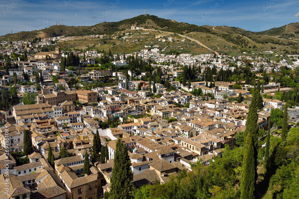 View of Albaicin with ancient wall from Alcazaba fortress in Granada Spain