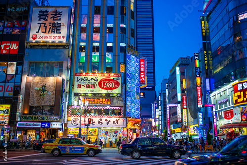 Tokyo Shinjuku Street with Advertising neon light photo
