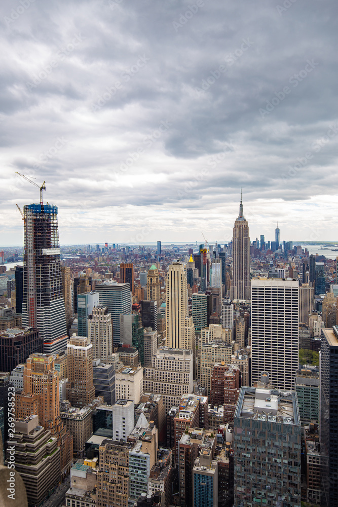 Fototapeta premium USA. New York. May 2019: View from the top.American aerial landscape with usa. Manhattan - New York City Aerial view. Midtown manhattan. Panoramic view. City financial district. New York skyline - USA