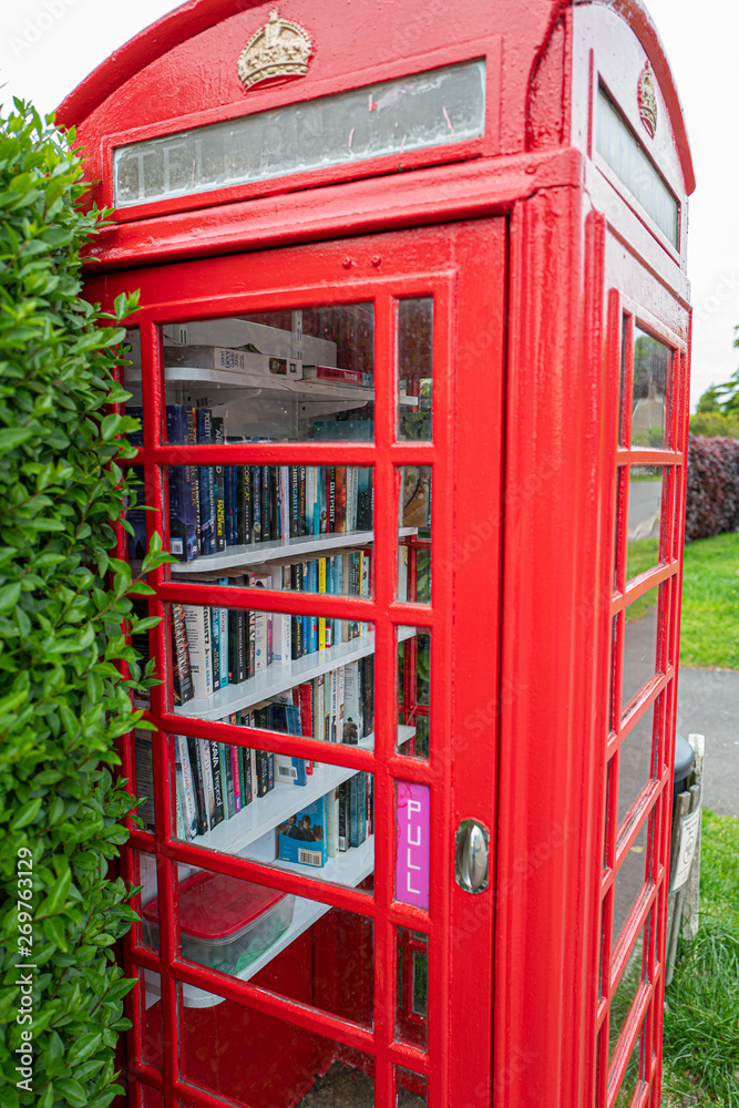 Old Phone box reused as a library Old Phone box reused as a library