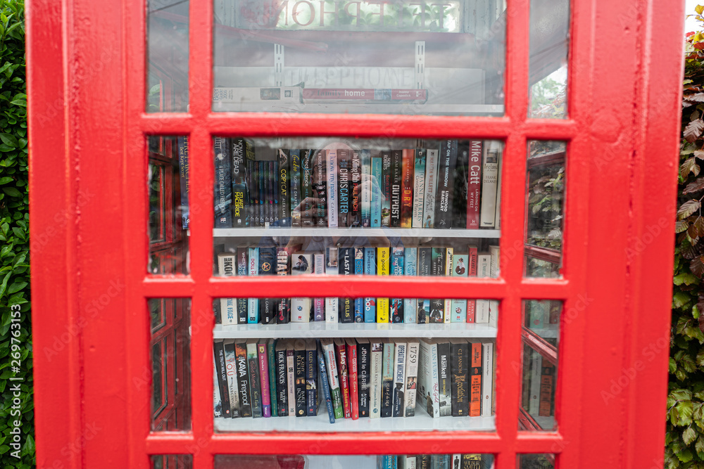 Obraz premium Old Phone box reused as a library