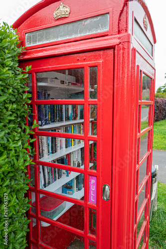 Old Phone box reused as a library © david