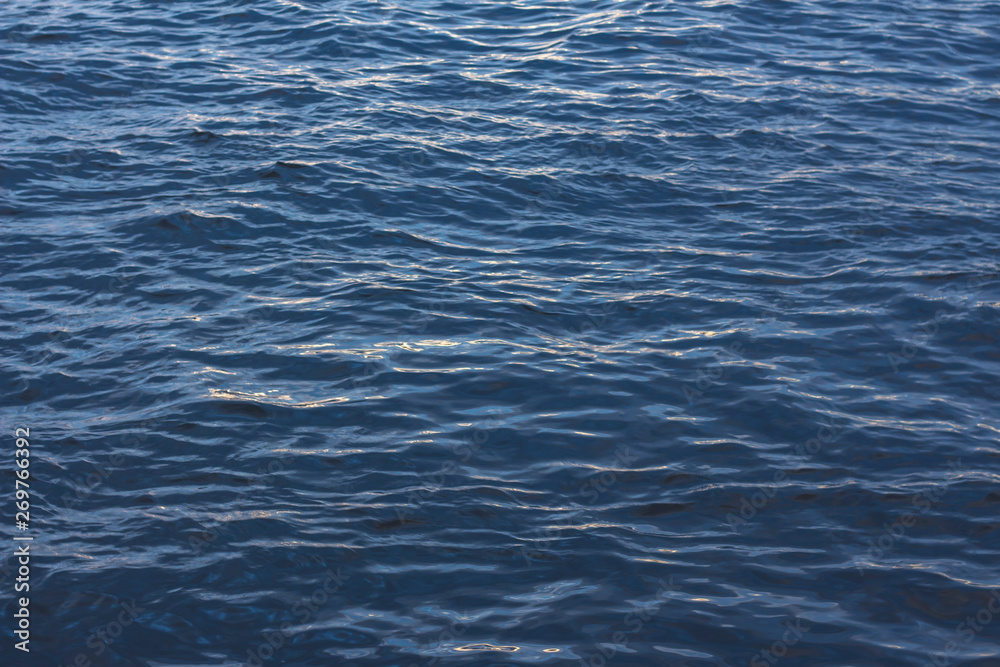  Beautiful sunset on the background of the sea with a purple shade