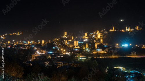 View of Svan towers with night illumination in Mestia village at night. Svaneti  Georgia