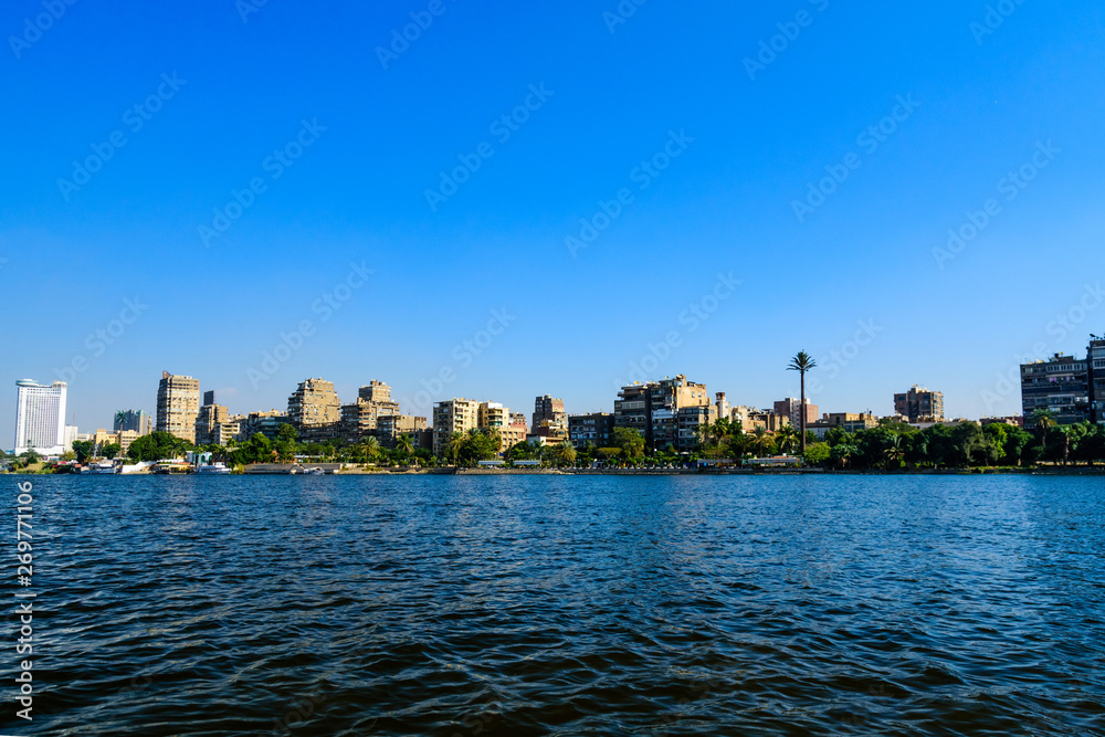 Residential and office buildings of the Cairo city. View from Nile river Residential and office buildings of the Cairo city. View from Nile river
