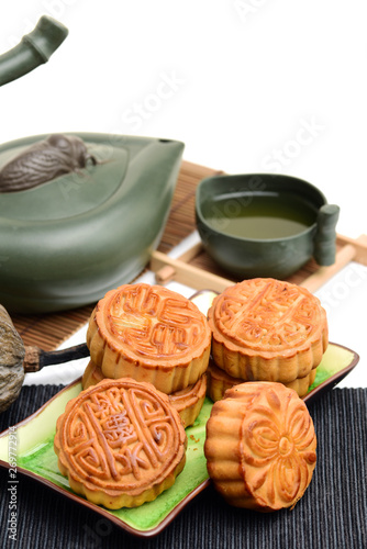 Mooncake and tea,Chinese mid autumn festival food on white background
