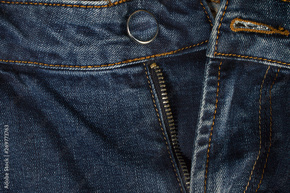 Blue jeans pants zipper close up photo. Blue jeans pants zipper close up photo.