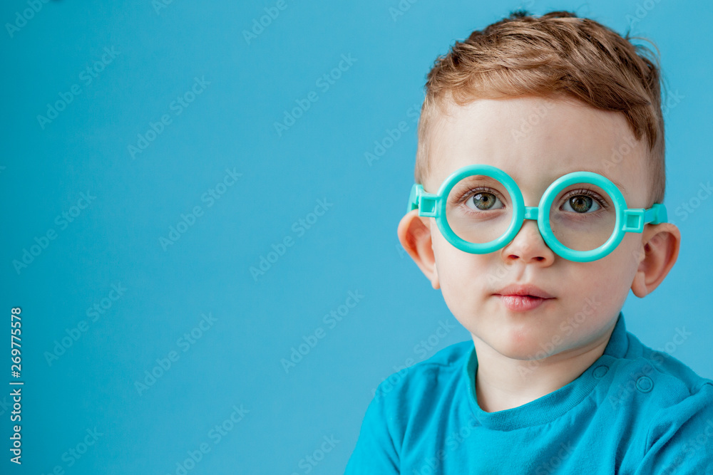 Cute little boy with letter on background. Child learn letters. Alphabet Cute little boy with letter on background. Child learn letters. Alphabet