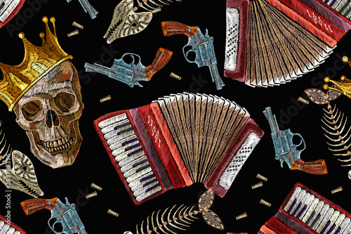 Embroidery golden crown, guns, skull and accordion seamless pattern. Music art. Template for clothes, t-shirt design. Chanson concept