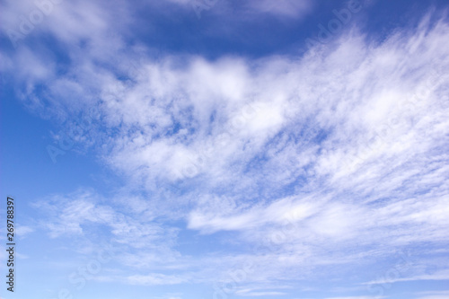 Clouds in motion in a blue sky