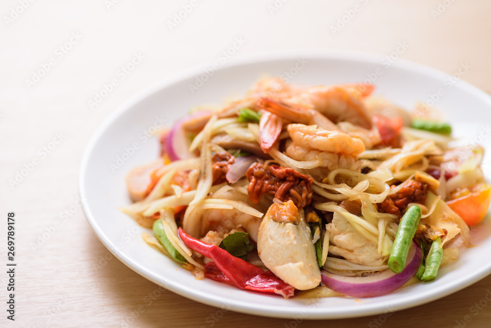 Spicy papaya salad with prawn, Thai food Spicy papaya salad with prawn, Thai food