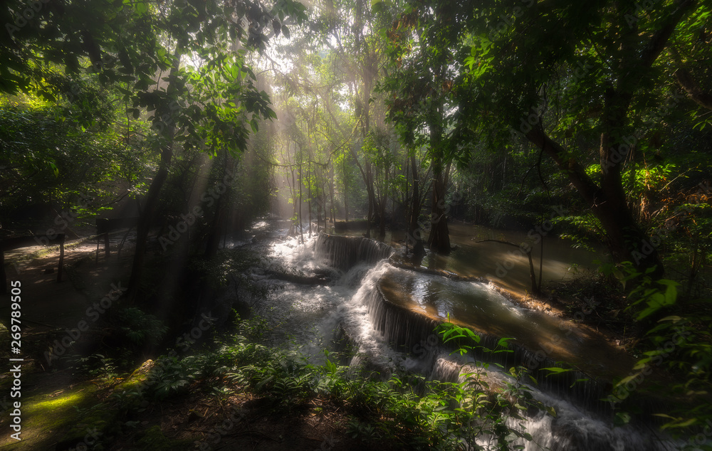 Fototapeta premium waterfall in Kanjanaburi Thailand (Huay Mae Kamin waterfall Nation Park).Huay Mae Kamin Waterfall, beautiful waterfall in deep forest, Kanchanaburi province, Thailand
