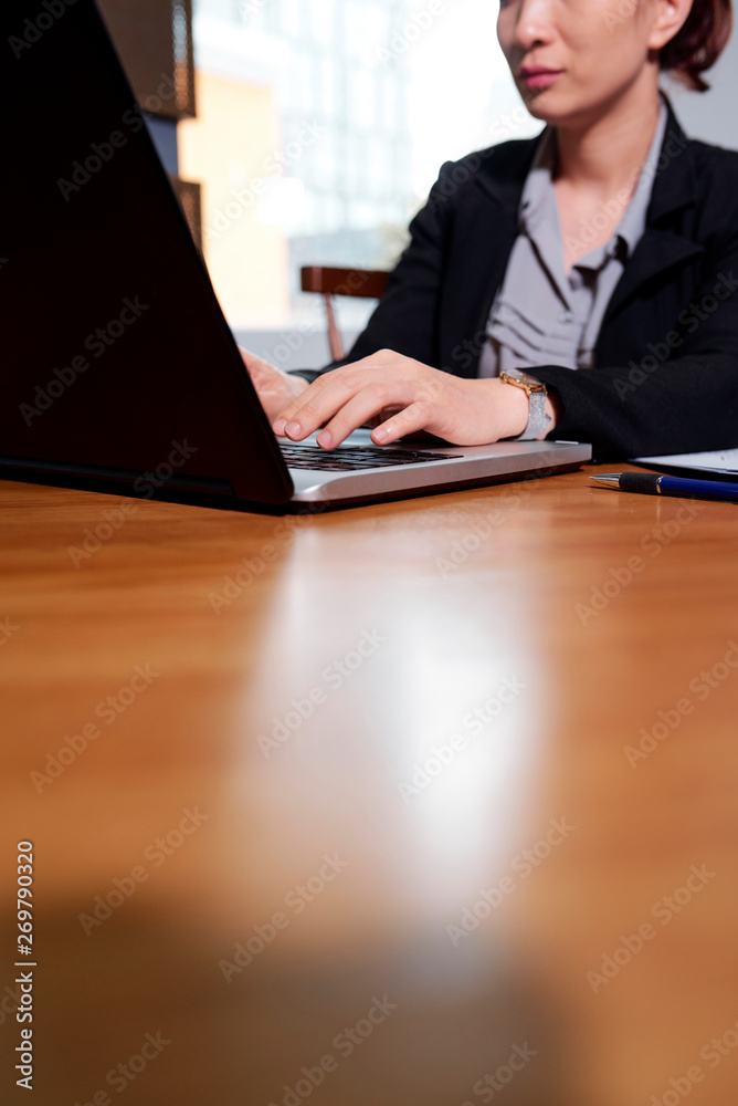 Businesswoman working on computer Businesswoman working on computer