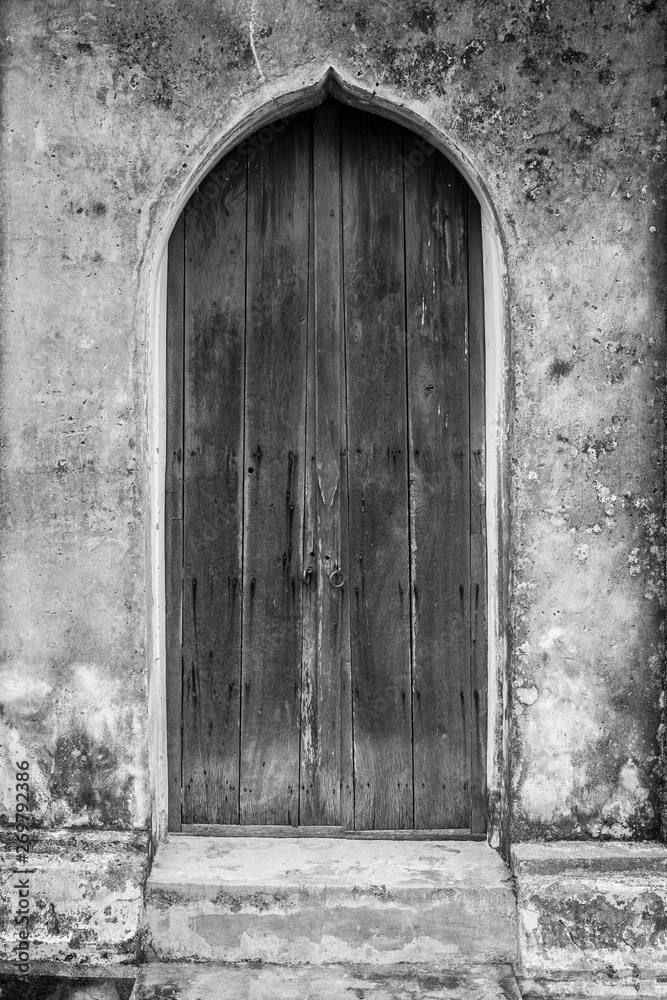 Old wooden door on historic buildings Old wooden door on historic buildings