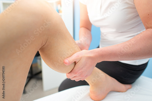 Massophysiotherapy treatment in the calf of a sportsman