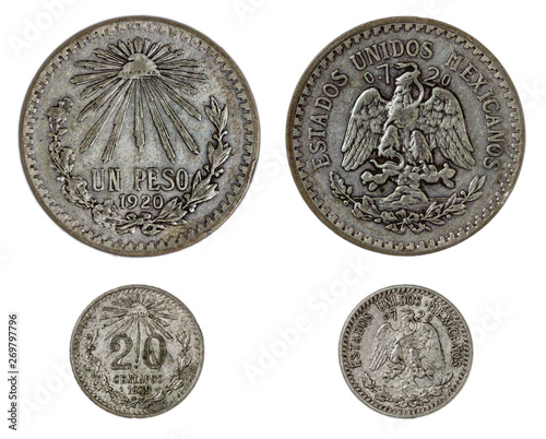 Two old mexican currency silver coins: one $1 Peso 1920 and one 20 cents 1939, both minted in 0.720 silver.